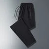 Men Plus Size Long Pants Black Breathable Stretch Sports Running Zipper Pockets Elastic Waist Drawstring Jogger Casual Pants