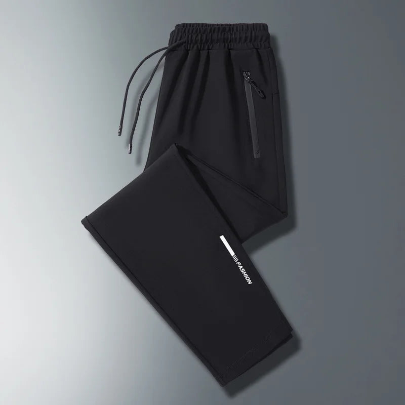 Men Plus Size Long Pants Black Breathable Stretch Sports Running Zipper Pockets Elastic Waist Drawstring Jogger Casual Pants