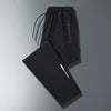 Men Plus Size Long Pants Black Breathable Stretch Sports Running Zipper Pockets Elastic Waist Drawstring Jogger Casual Pants
