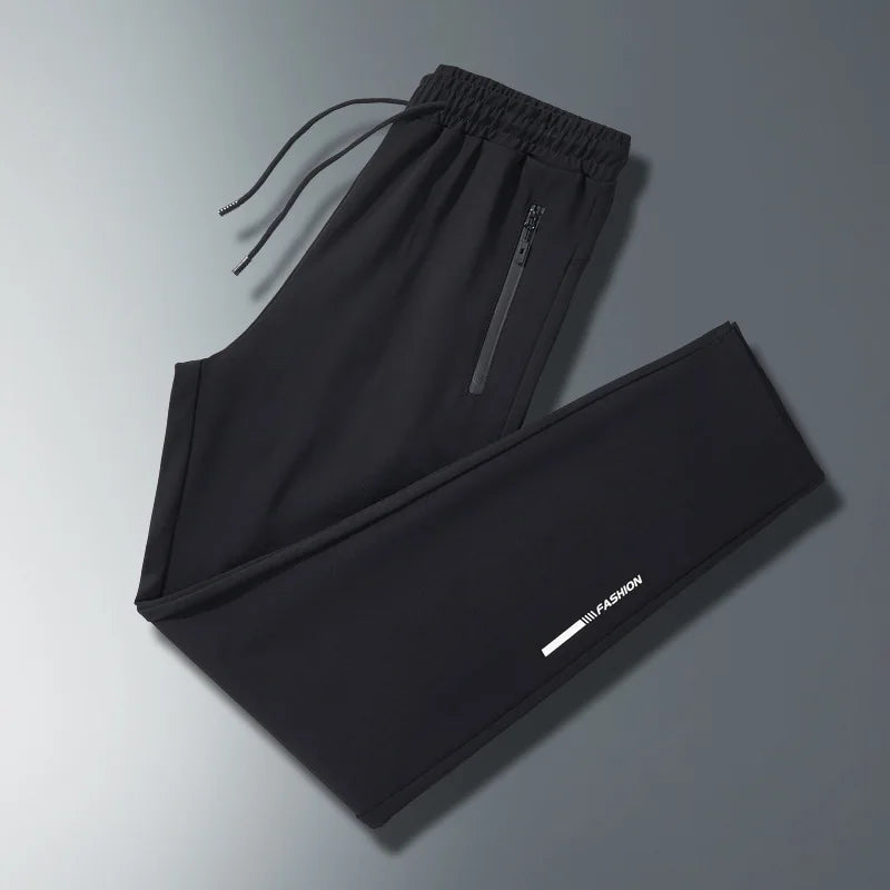 Men Plus Size Long Pants Black Breathable Stretch Sports Running Zipper Pockets Elastic Waist Drawstring Jogger Casual Pants