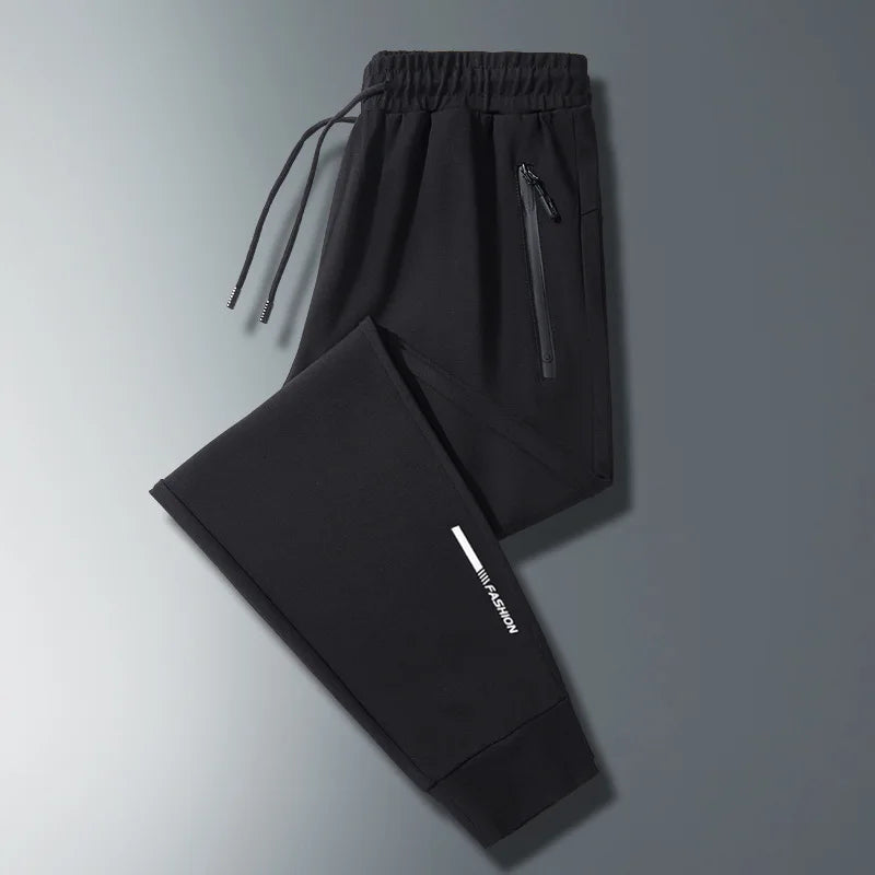 Men Plus Size Long Pants Black Breathable Stretch Sports Running Zipper Pockets Elastic Waist Drawstring Jogger Casual Pants
