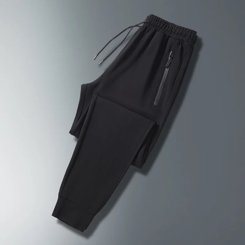 Men Plus Size Long Pants Black Breathable Stretch Sports Running Zipper Pockets Elastic Waist Drawstring Jogger Casual Pants